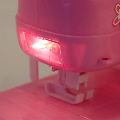 Mini máquina de coser para niños